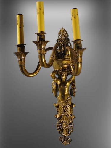 Pair of Cast Bronze Egyptian Revival Figural Sconces